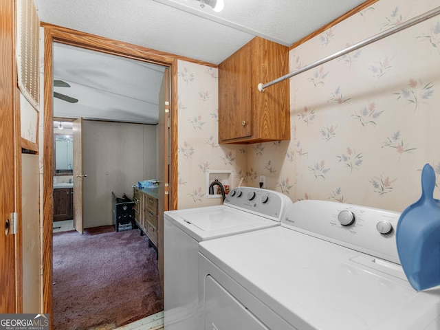 laundry area with separate washer and dryer, cabinets, a textured ceiling, and carpet