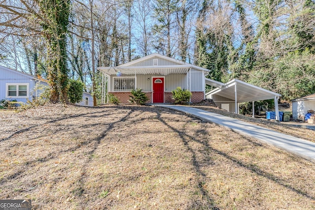 ranch-style home featuring a carport