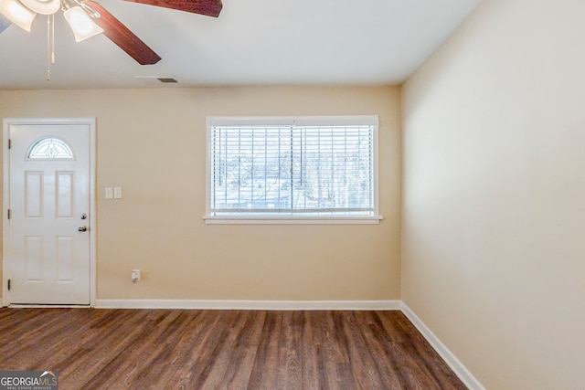 entrance foyer featuring dark wood-type flooring and ceiling fan