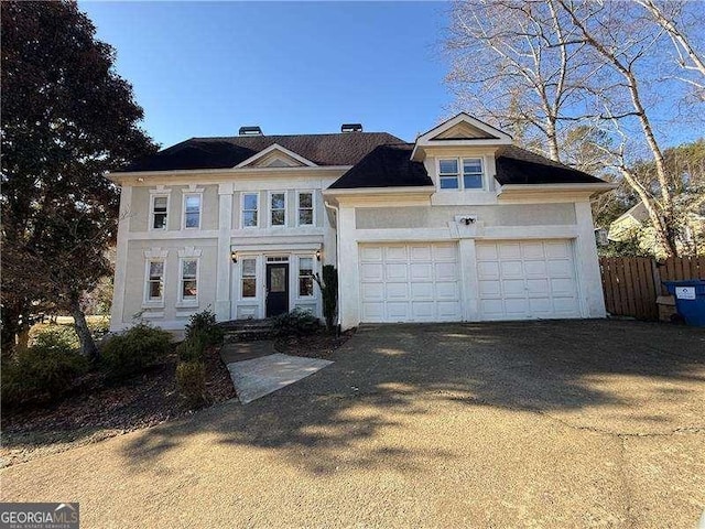 view of front of home with a garage