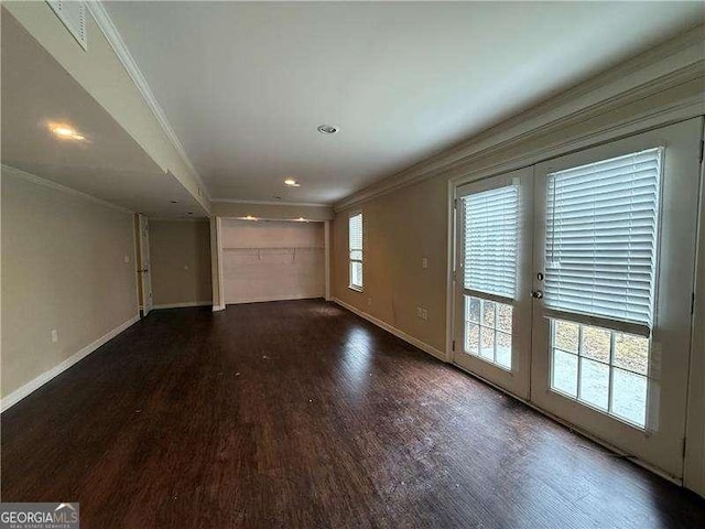 interior space with crown molding, dark hardwood / wood-style floors, and french doors