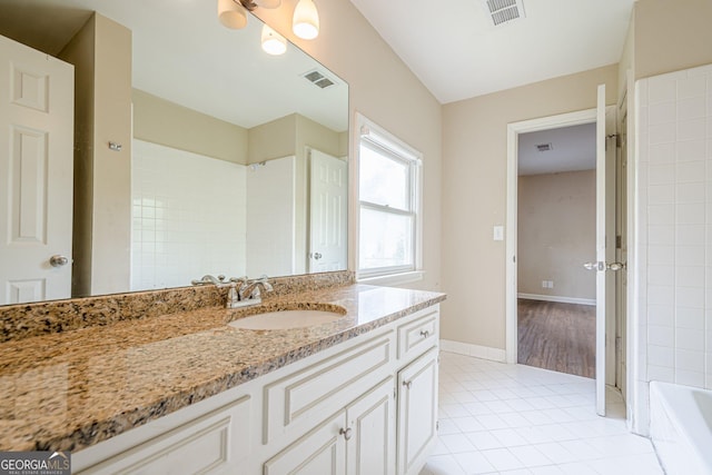 full bathroom featuring tile patterned floors, vanity, and visible vents