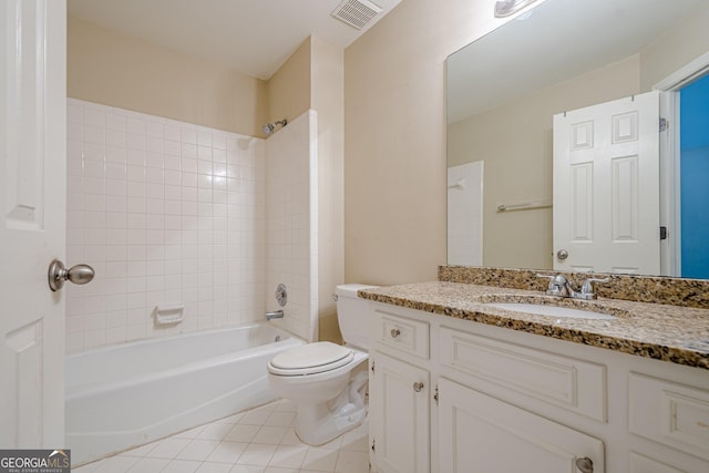 full bath with shower / bathtub combination, vanity, visible vents, toilet, and tile patterned floors