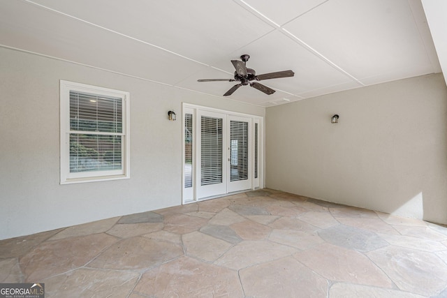 view of patio featuring ceiling fan