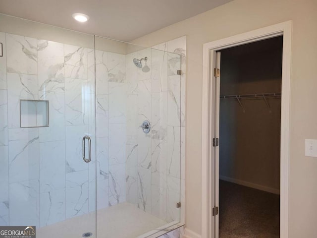 bathroom with an enclosed shower