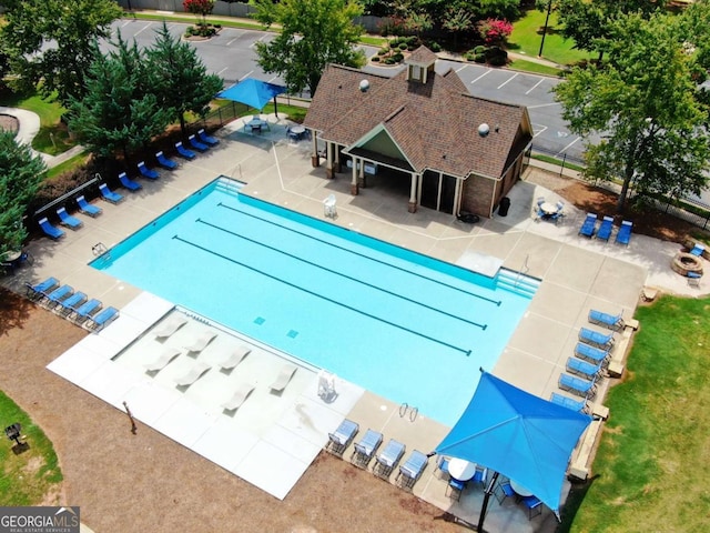 view of swimming pool featuring a patio area