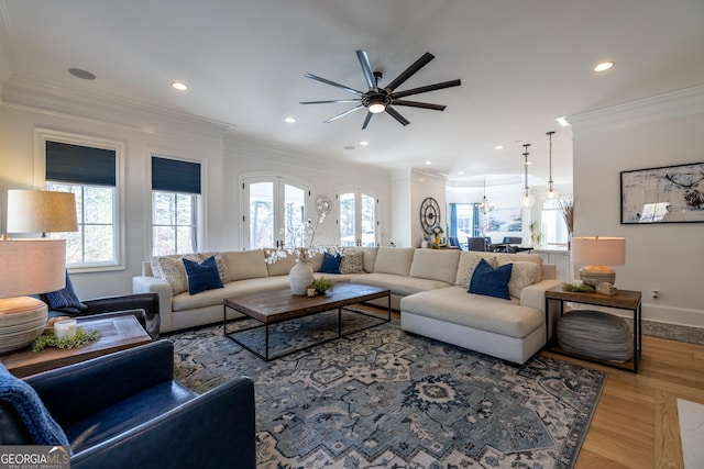 living room with crown molding and wood-type flooring