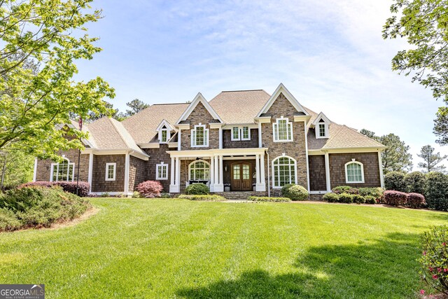 2938 Old Dalton Rd NE, Rome, GA 30165 - view of front of house with stone siding, a shingled roof, and a front lawn