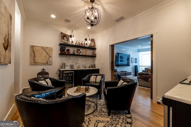 interior space with crown molding and light wood-type flooring