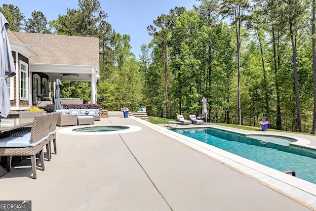 2938 Old Dalton Rd NE, Rome, GA 30165 - pool with a diving board, an outdoor living space, a patio, and an in ground hot tub
