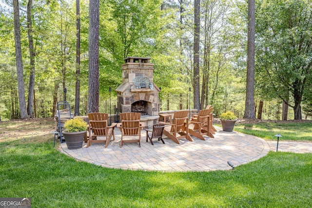 2938 Old Dalton Rd NE, Rome, GA 30165 - view of patio featuring an outdoor stone fireplace