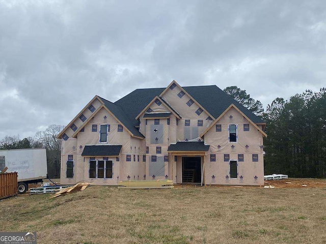 property under construction featuring a front yard