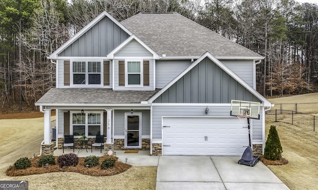 craftsman-style house with a garage and covered porch