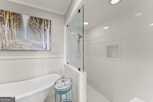 bathroom featuring crown molding and plus walk in shower