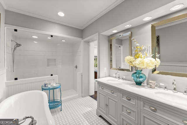 bathroom with vanity, tile patterned flooring, crown molding, and plus walk in shower