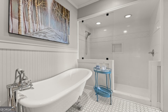 bathroom with ornamental molding and plus walk in shower