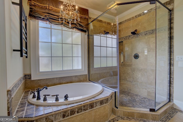 bathroom with an inviting chandelier, a healthy amount of sunlight, ornamental molding, and plus walk in shower