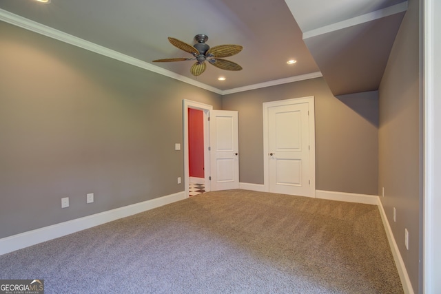 unfurnished bedroom featuring carpet floors and ornamental molding