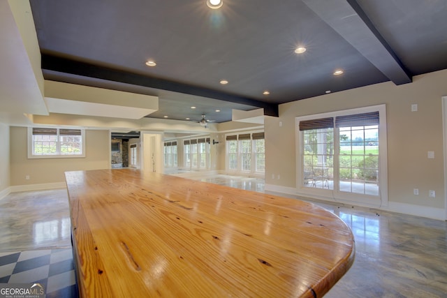 interior space featuring beamed ceiling