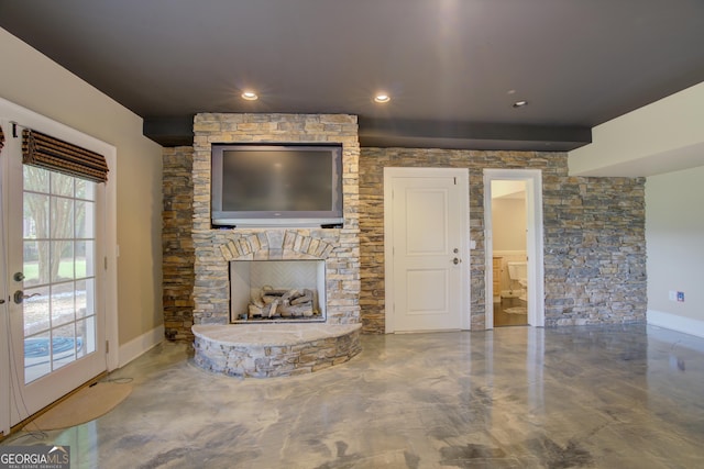 unfurnished living room featuring a fireplace