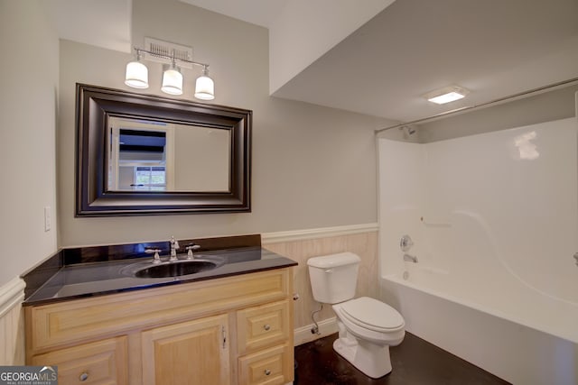 full bathroom featuring vanity, shower / bathing tub combination, and toilet