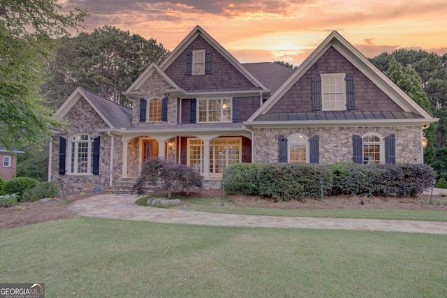 view of front of home featuring a yard