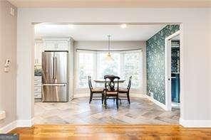 dining room with hardwood / wood-style flooring