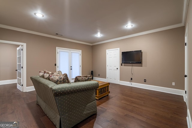 living room with crown molding, dark wood-type flooring, and french doors