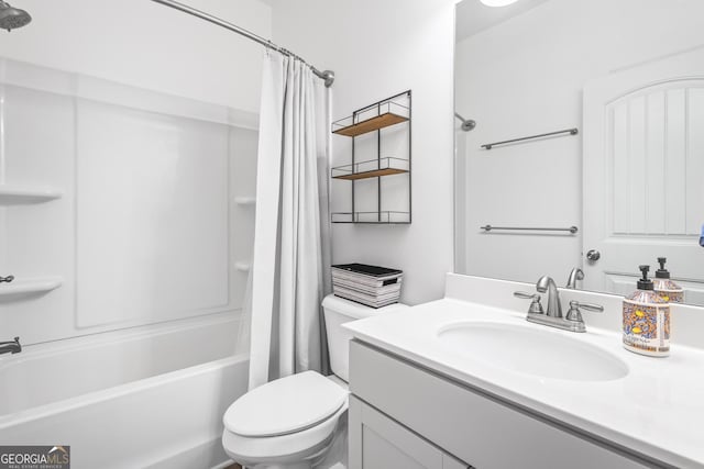 bathroom with toilet, vanity, and shower / bath combination with curtain