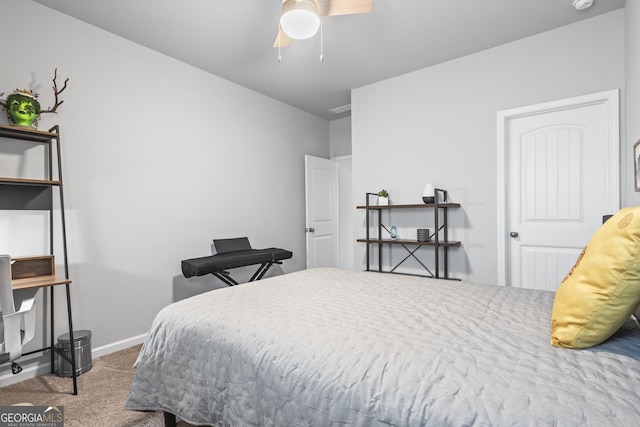 carpeted bedroom featuring baseboards