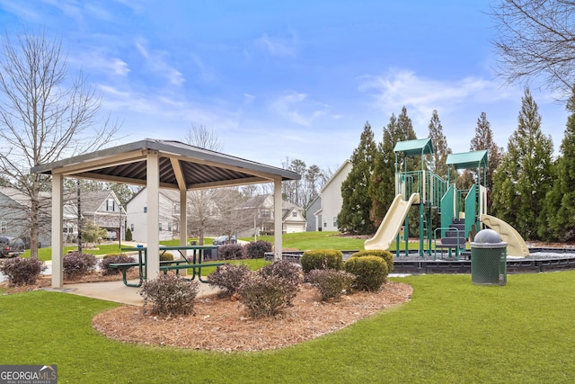 communal playground with a gazebo and a yard