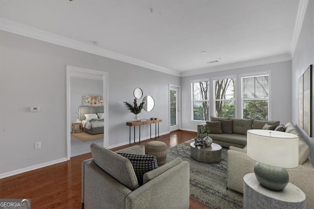 living room featuring dark wood-type flooring and ornamental molding