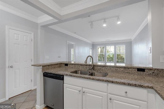 kitchen with light stone counters, dishwasher, sink, and white cabinets