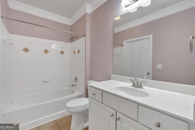 full bathroom featuring tiled shower / bath, tile patterned flooring, vanity, toilet, and crown molding