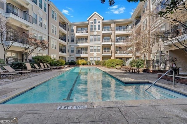 view of pool with a patio area