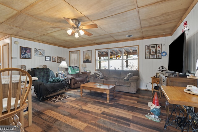 living room with dark hardwood / wood-style floors and ceiling fan