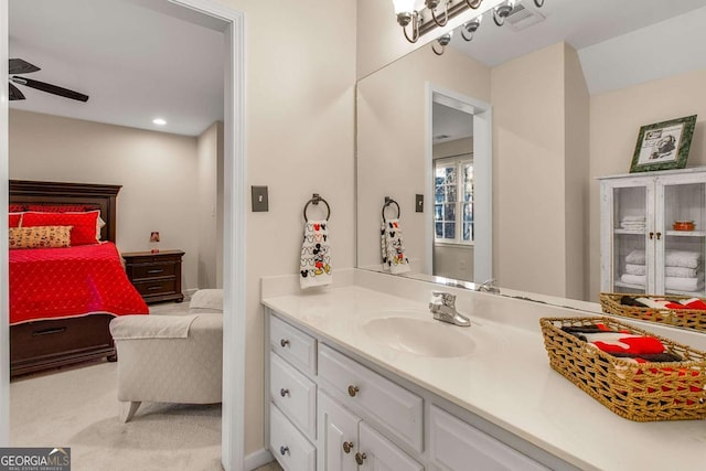 bathroom featuring vanity and ceiling fan