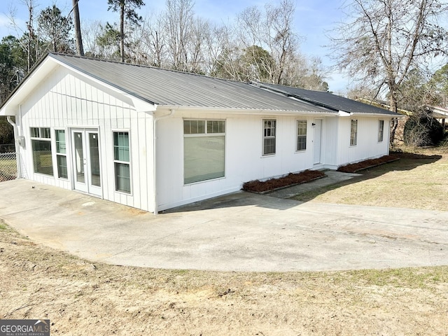 rear view of property with a patio area