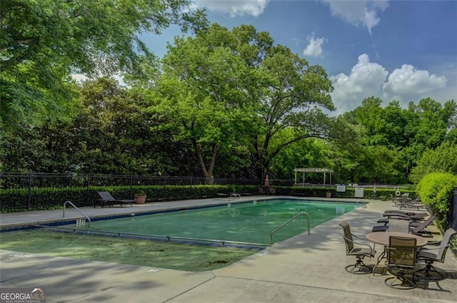 view of pool featuring a pergola