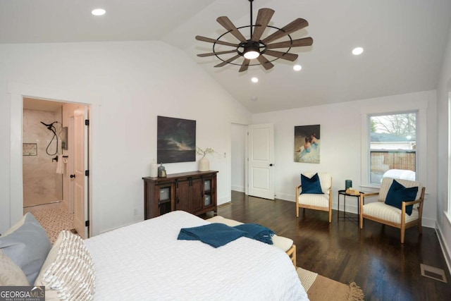 bedroom with connected bathroom, dark wood-type flooring, ceiling fan, and vaulted ceiling