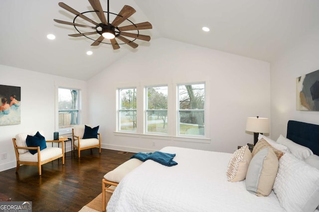 bedroom with dark hardwood / wood-style flooring, vaulted ceiling, and ceiling fan