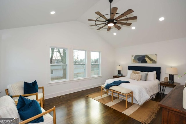 bedroom featuring lofted ceiling and dark hardwood / wood-style floors