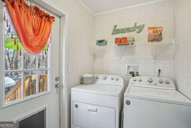 laundry room with separate washer and dryer and ornamental molding