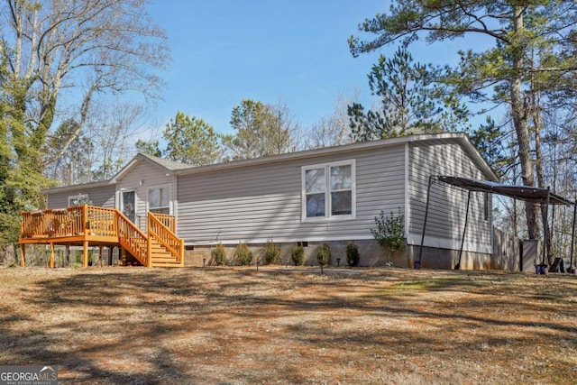 view of front of house with a deck