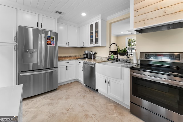 kitchen with white cabinetry and appliances with stainless steel finishes