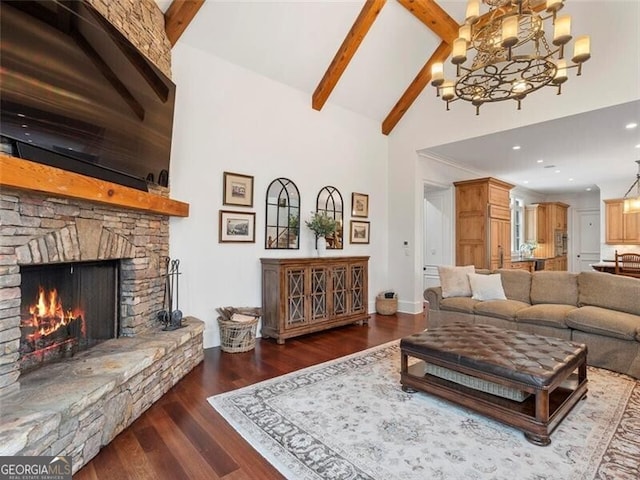 living room featuring beam ceiling, high vaulted ceiling, dark hardwood / wood-style floors, a notable chandelier, and a fireplace