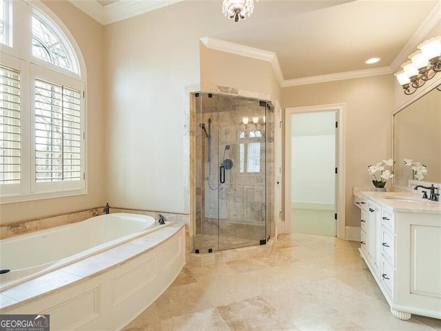 bathroom with ornamental molding, shower with separate bathtub, a healthy amount of sunlight, and vanity