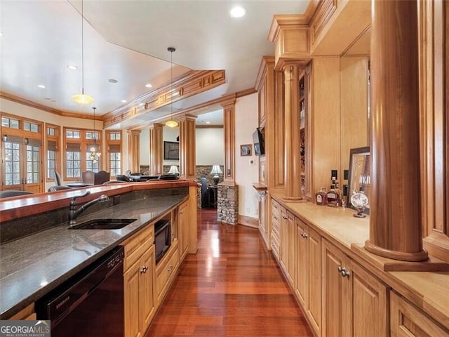 kitchen with pendant lighting, sink, decorative columns, black dishwasher, and ornamental molding