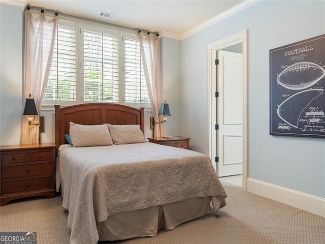 bedroom featuring ornamental molding and light colored carpet