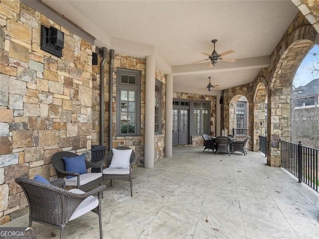 view of patio / terrace with ceiling fan